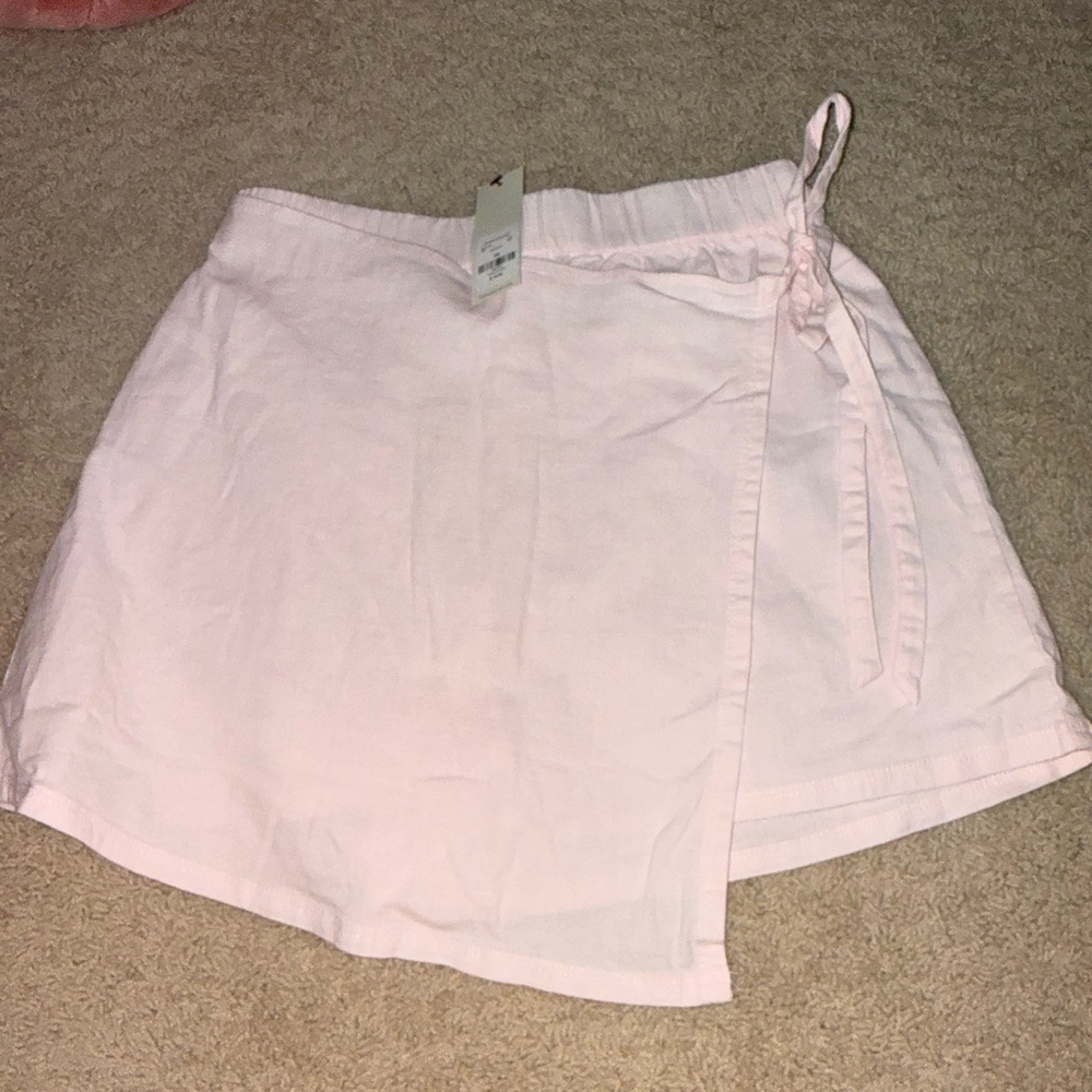 Francesca's Collections Pale Pink Mini Wrap Skirt